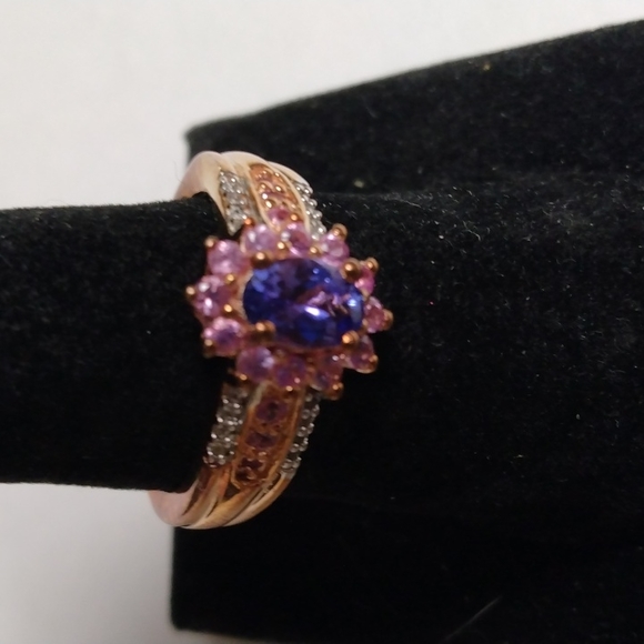 Stamped .925 Tanzanite, Sapphire and Diamond Ring. 4.4 Grams